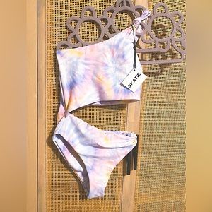 Skatie Nicole one piece cut out new XS in limited Tavarua pattern.